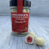 Geschockte Himbeeren im weissen Mäntelsche - Himbeeren in weißer Schokolade | Die Hessenmeister®